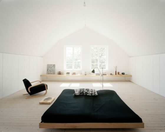 View of Stylish and modern minimalist living room featuring an open ... - Alamy