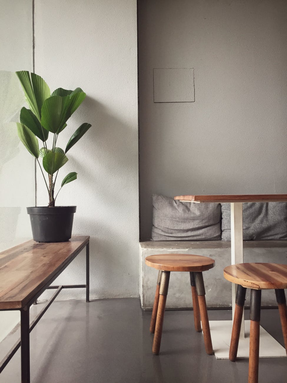 wooden bench and stools in a cozy room